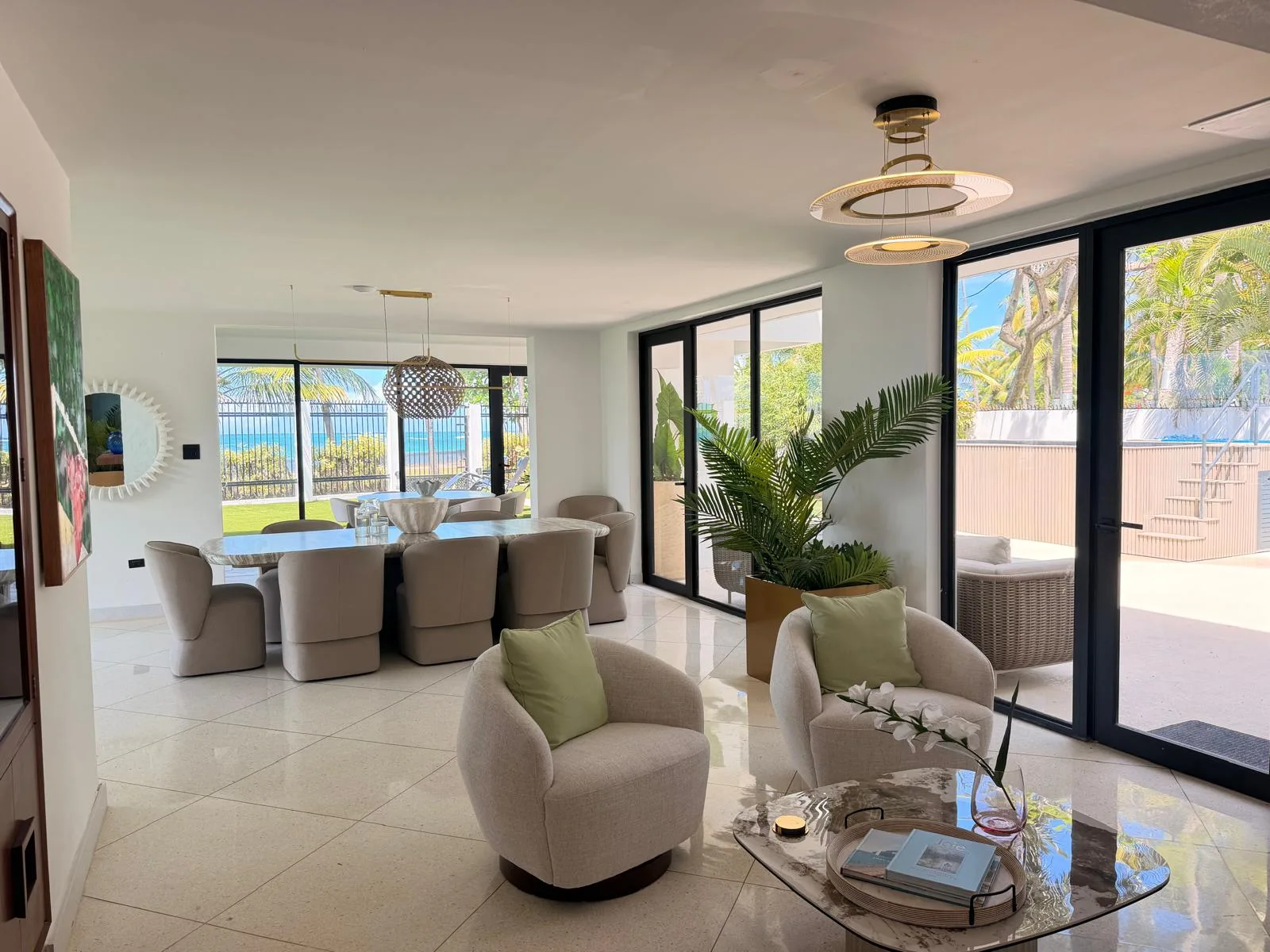 The main living and dining room, open to the ocean