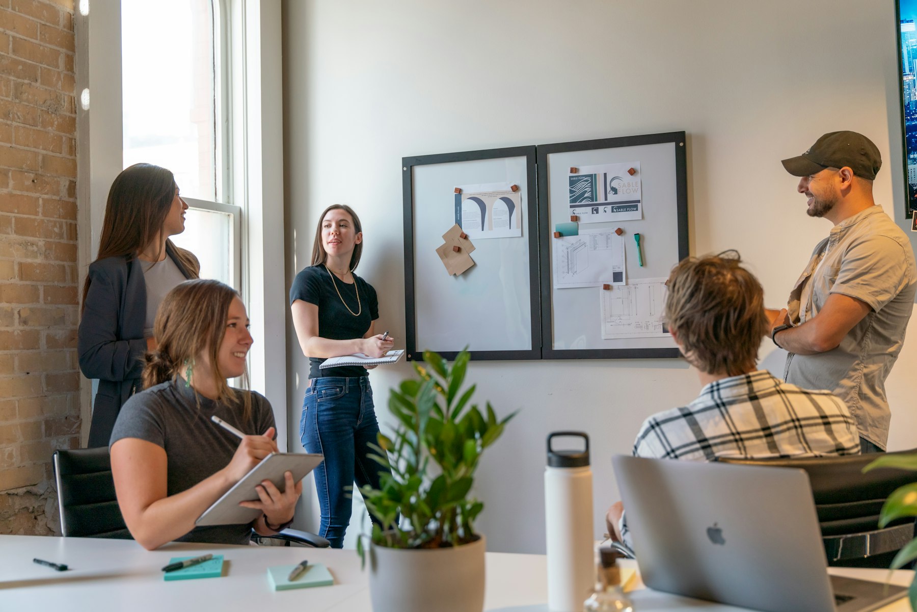 Team working session in a sunlit meeting room